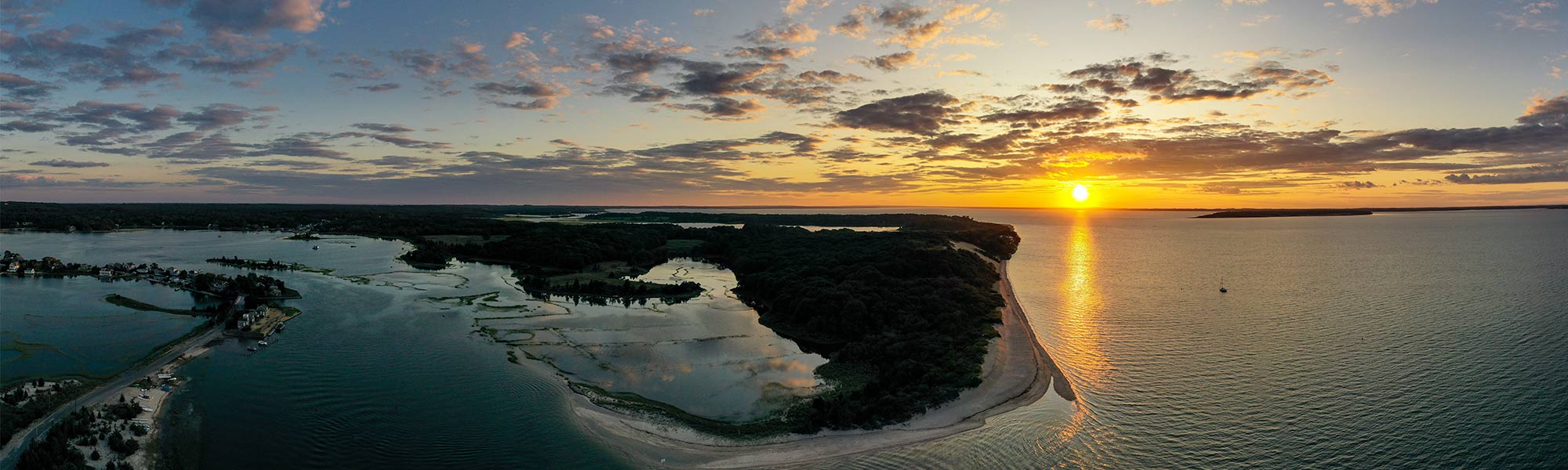 Scenic overrhead shot of the Peconic River at sunset